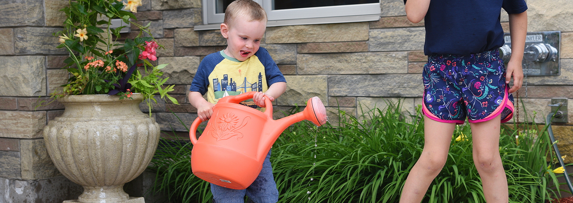 Boy with Watering Can