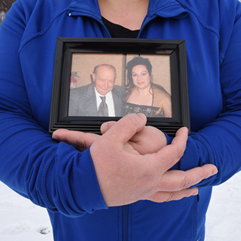 Gina holds Nonno's picture close